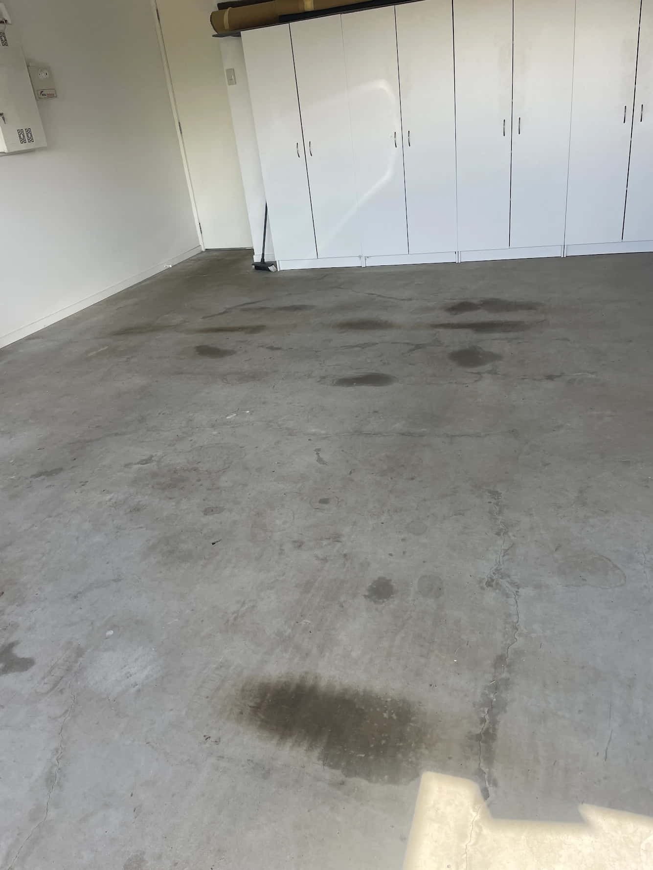 Before epoxy garage floor Pacific Pines