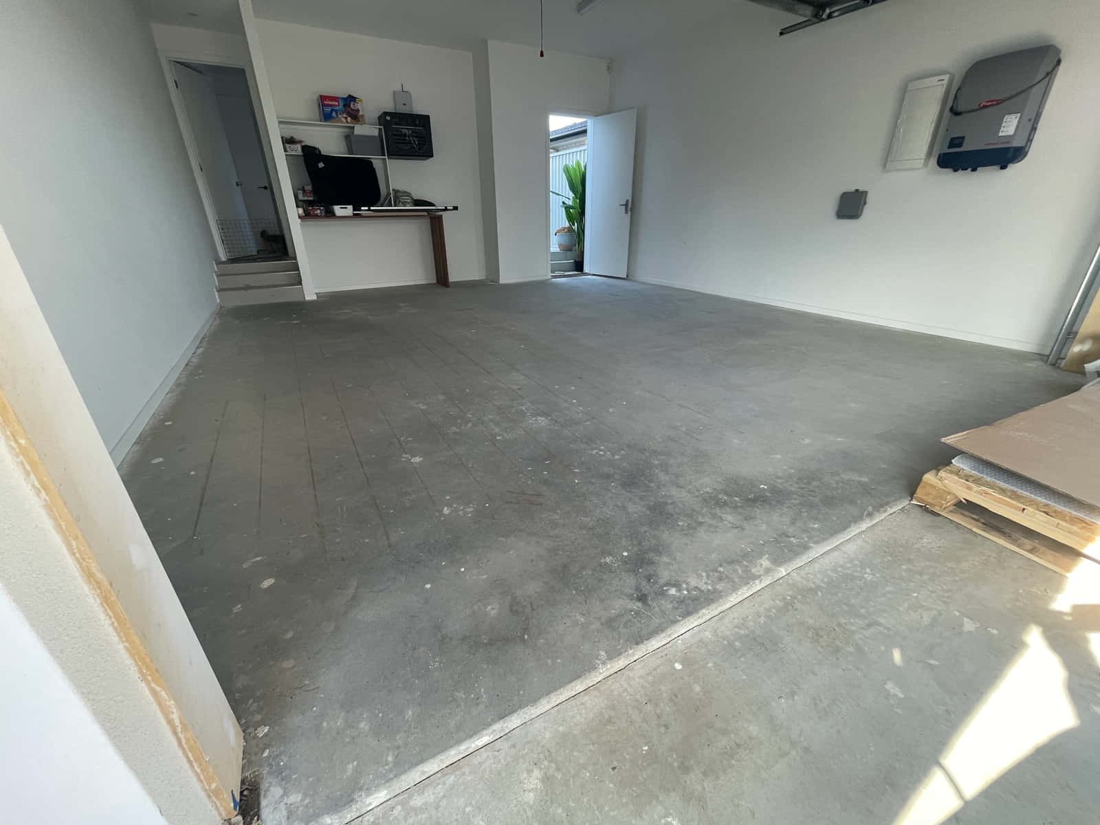 Before epoxy garage floor Coomera